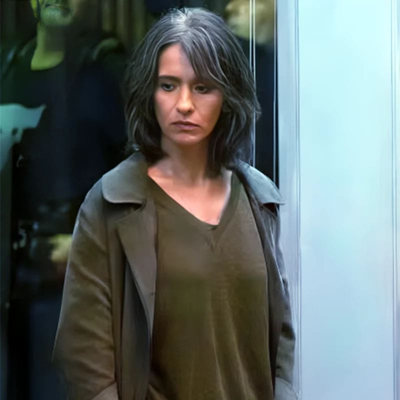 SaraWoman in the Shadows Sara Morozzi Green Coat