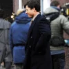 The Running Man Ben Richards Glen Powell Black Coat