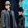 Louis Partridge House of Guinness Grey Coat