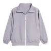 Adele Exarchopoulos Paris Fashion Week 2025 Grey Jacket