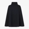 Claudia Winkleman Celebrity Traitors Black Coat