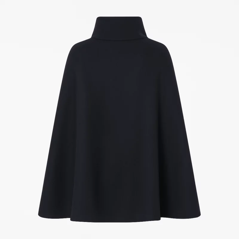 Claudia Winkleman Celebrity Traitors Black Coat