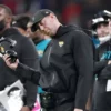 Jacksonville Jaguars Liam Coen Black Hooded Jacket