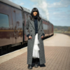 Claudia Winkleman The Celebrity Traitors Grey Coat