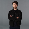 The Fall and Rise of Reggie Dinkins Daniel Radcliffe Black Jacket front view