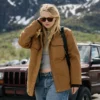 The Sun Never Sets Dakota Fanning Brown Jacket