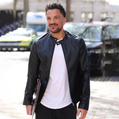 London Singer Peter Andre Black Jacket front view